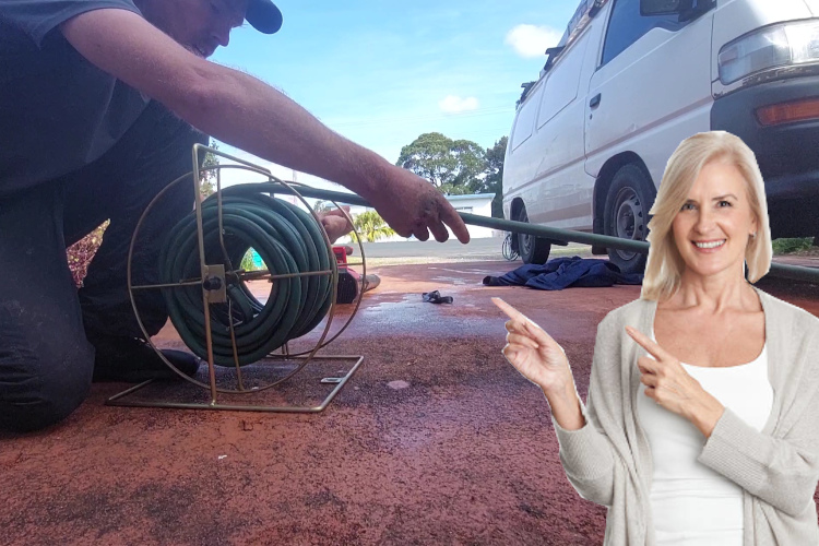 
A productive day of gutter rinsing ends as a narooma cleaner tidies up the hose.